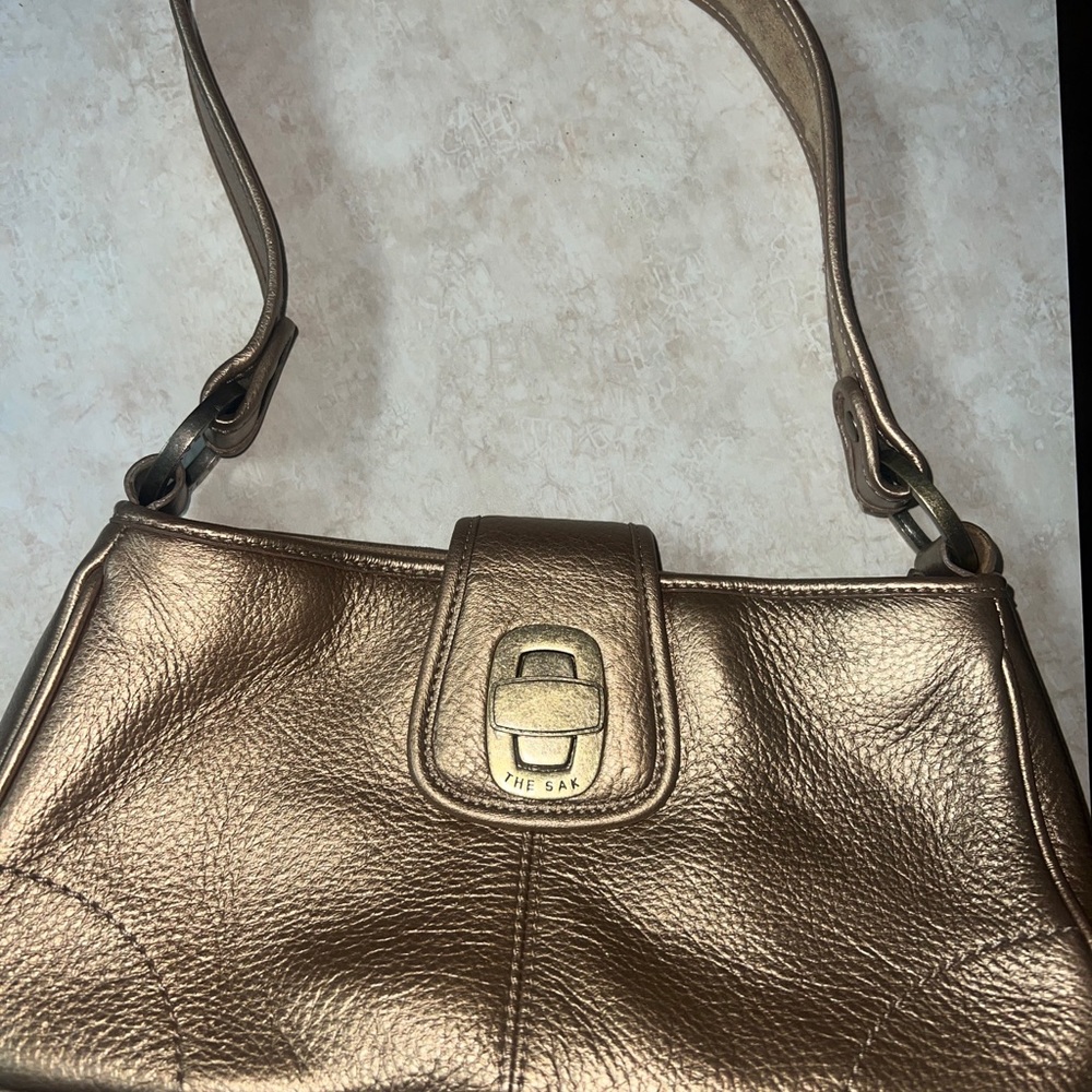 The SAK pink label shoulder bag size 11 by 8 perfect addition to you wardrobe.